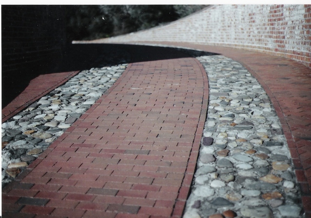 Straight vs. Curved Denver Brick Walkways
